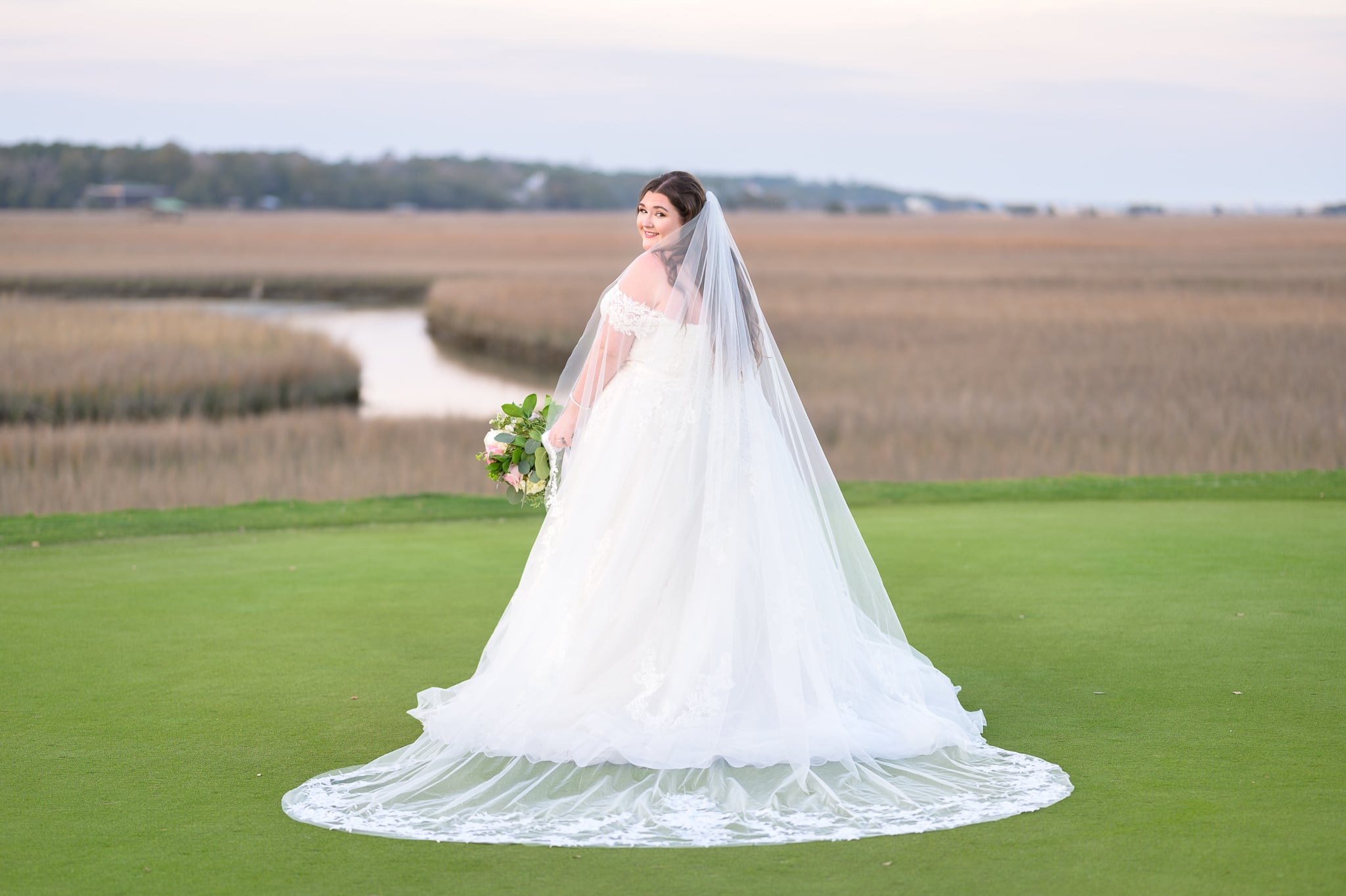 Bride looking back facing the marsh - Pawleys Plantation Golf & Country Club