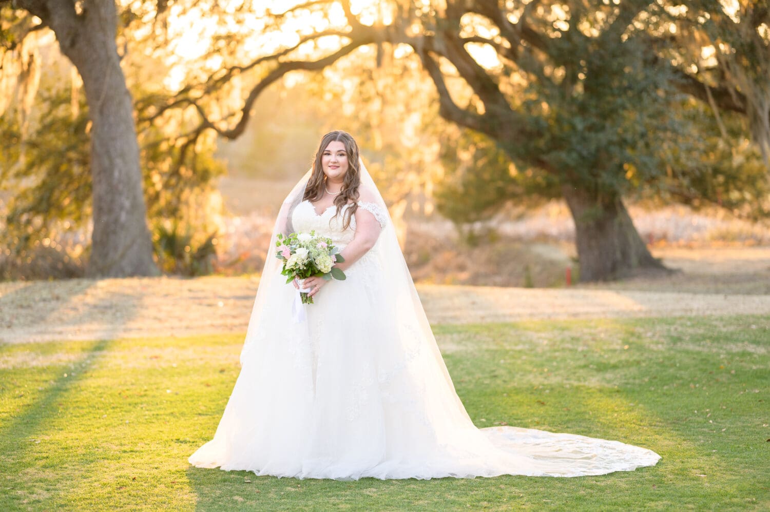 Bride with branches from old oak in the background - Pawleys Plantation Golf & Country Club