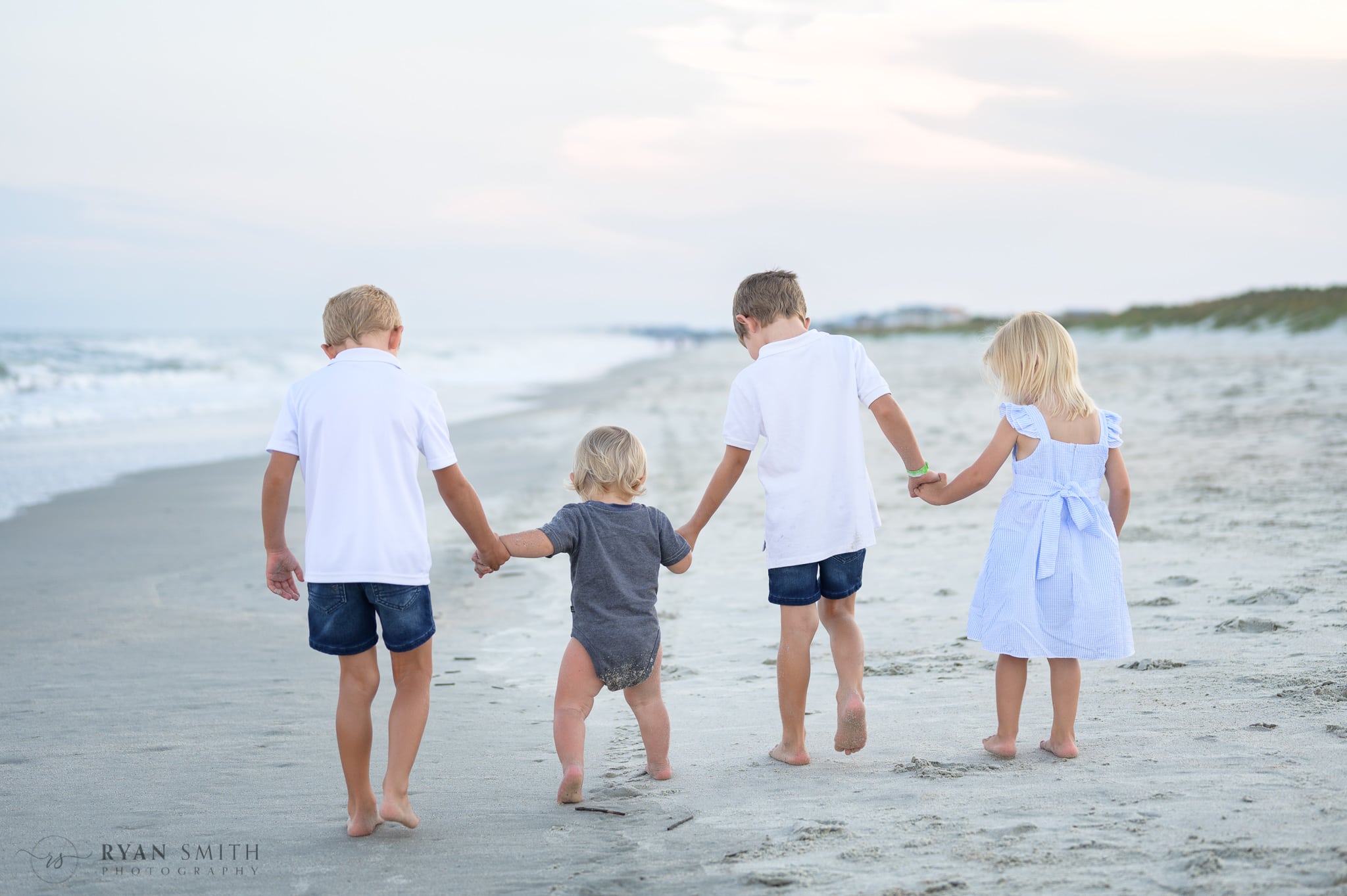 Family of 6 on the beach - Huntington Beach State Park
