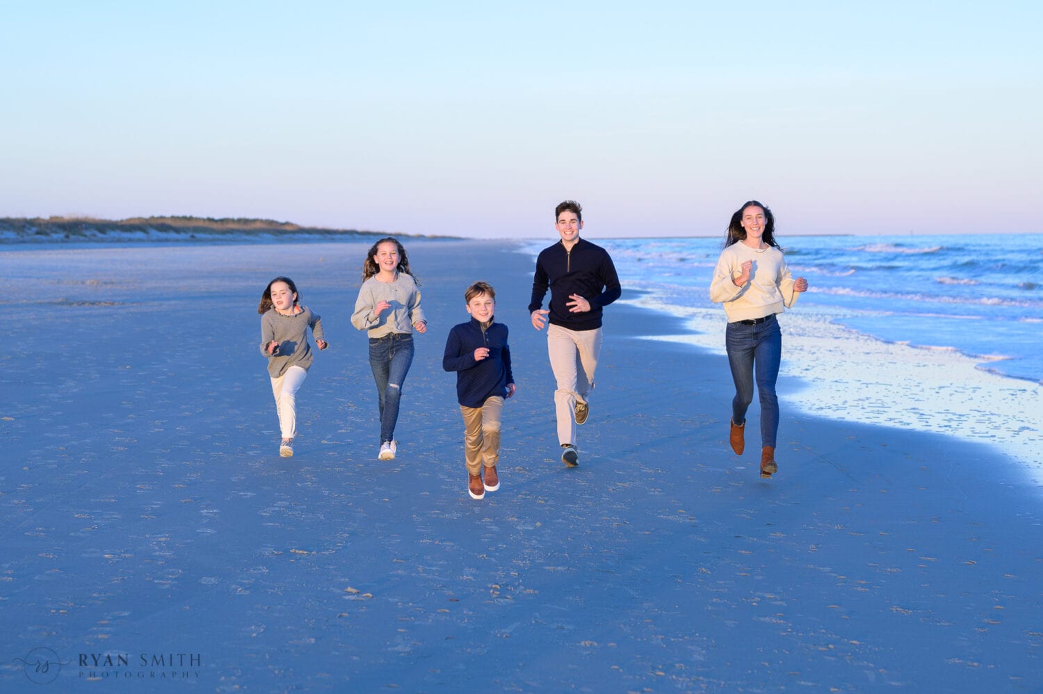 Family of 7 having fun on the beach - Huntington Beach State Park
