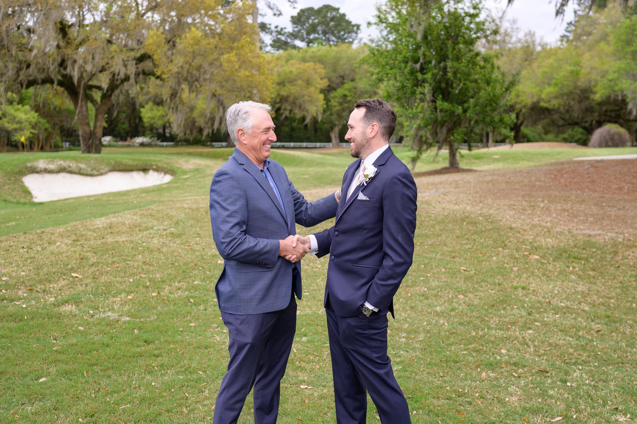 Father shaking hand of the groom - Caledonia Golf & Fish Club