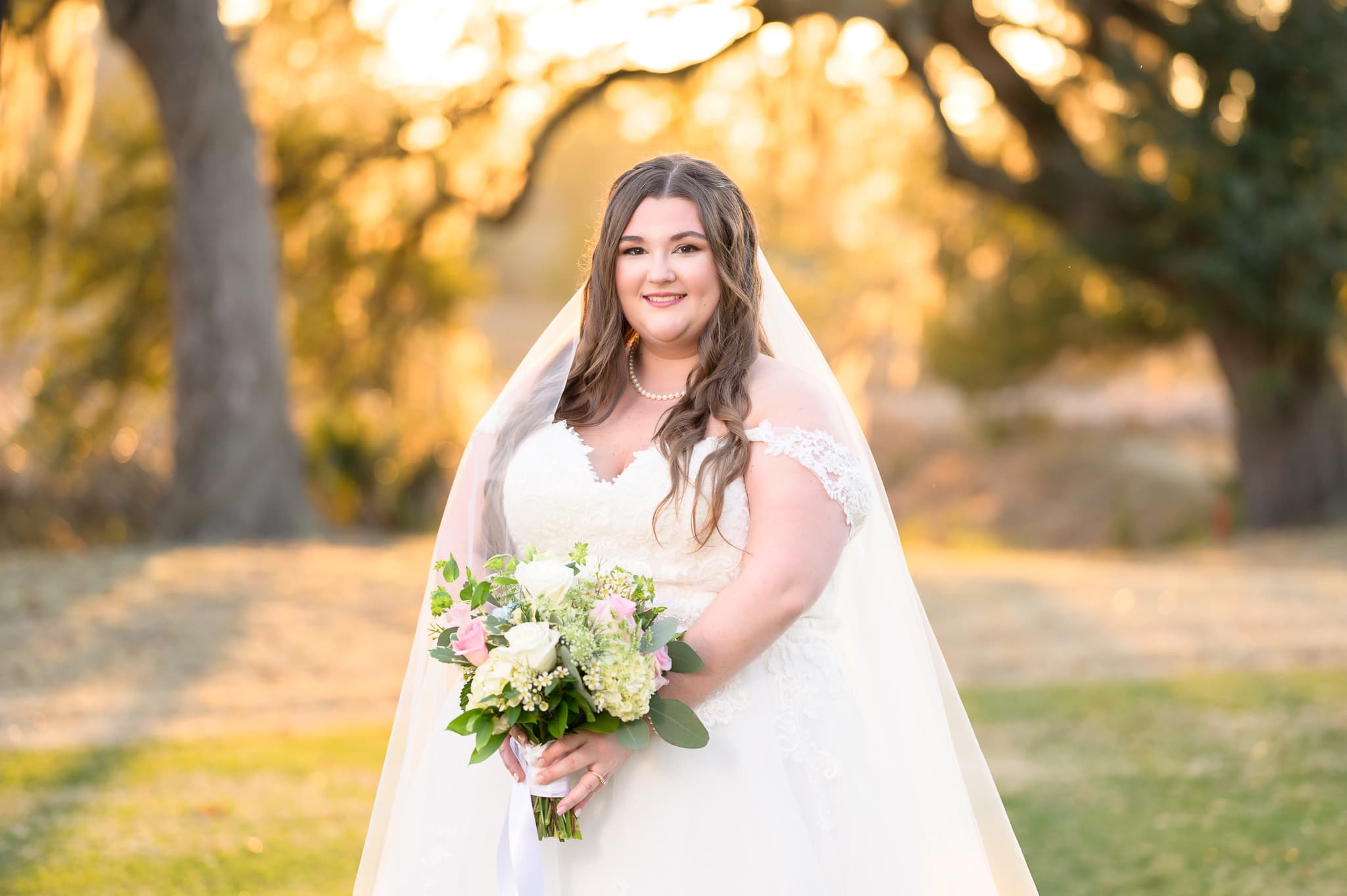 Bridal portraits on the golf course at Pawleys Plantation