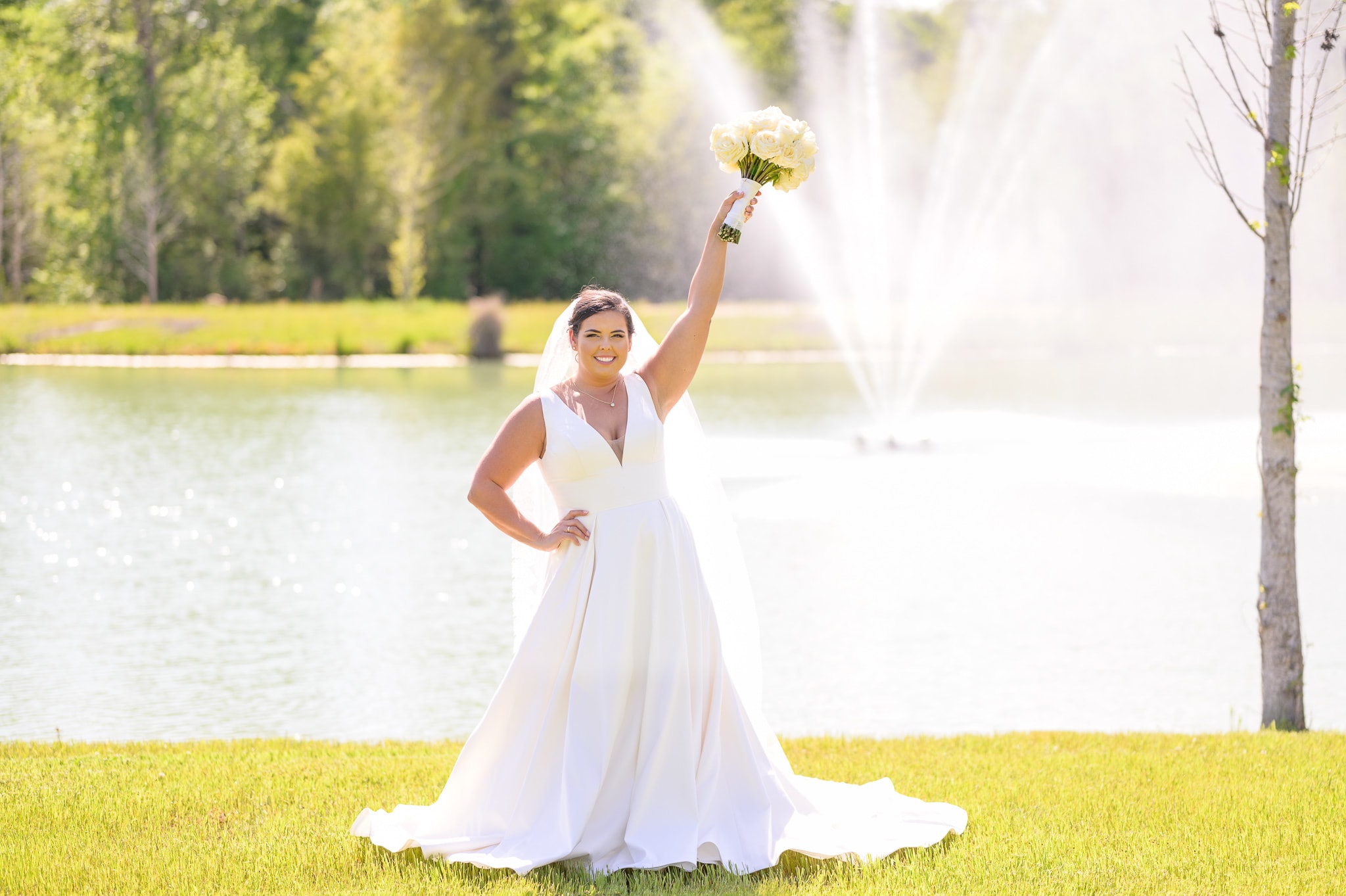 Portraits of the bride by the fountain - The Venue at White Oaks Farm