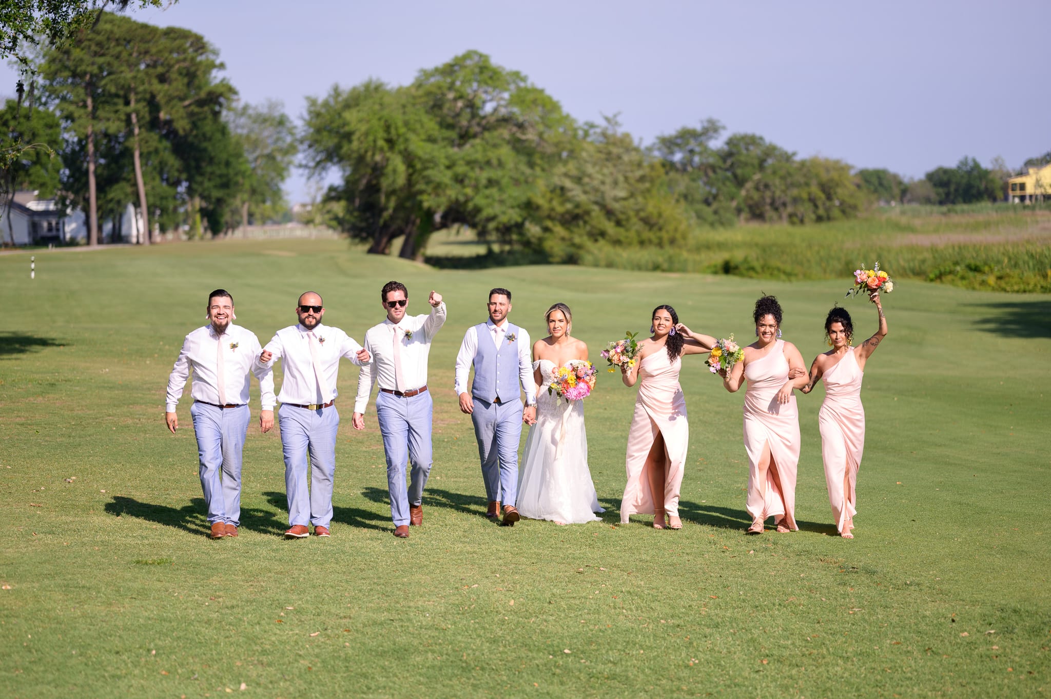 Bridal party walking down the golf course - Pawleys Plantation Golf & Country Club