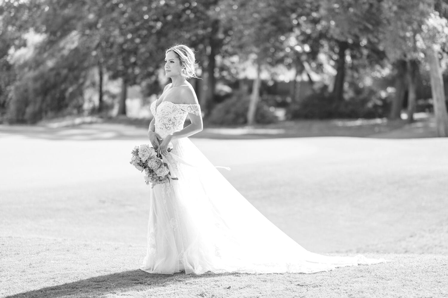 Bride standing in the sunlight - Pawleys Plantation Golf & Country Club