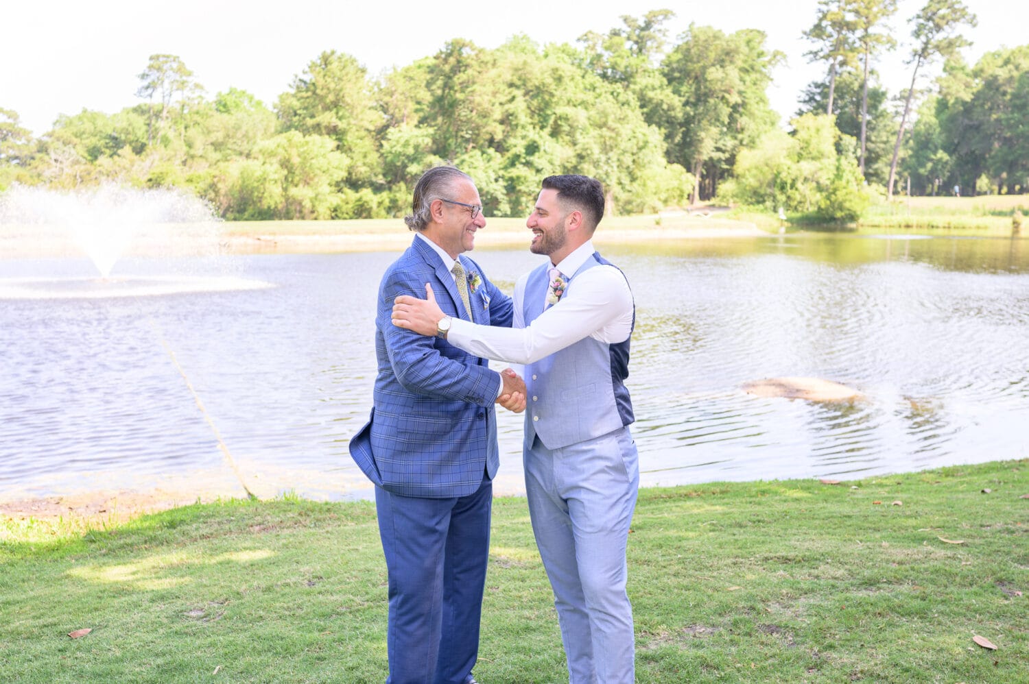 Groom shaking hands with his father - Pawleys Plantation Golf & Country Club