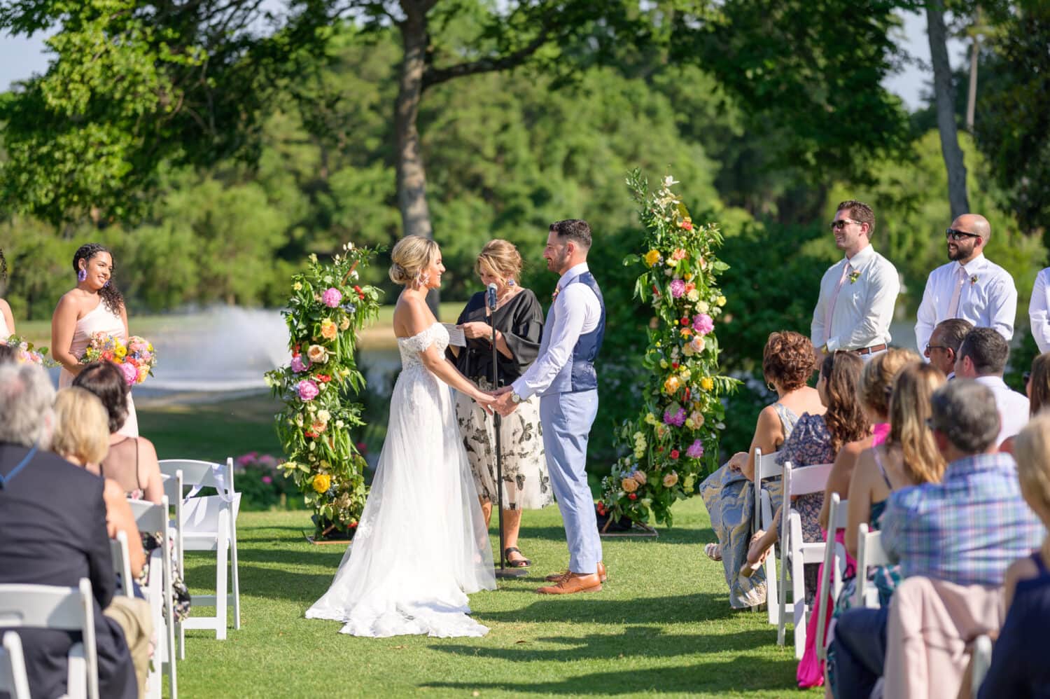Holding hands during the ceremony - Pawleys Plantation Golf & Country Club