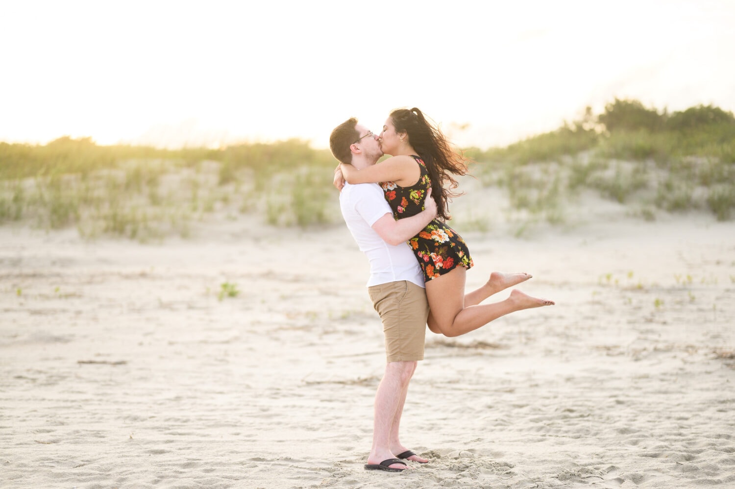 Lifting fiance into the air in the sunset - Huntington Beach State Park - Myrtle Beach