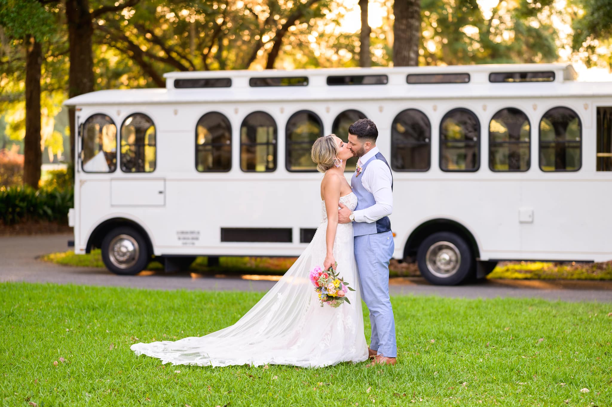 Portraits of the bride and groom with the white trolly - Pawleys Plantation Golf & Country Club