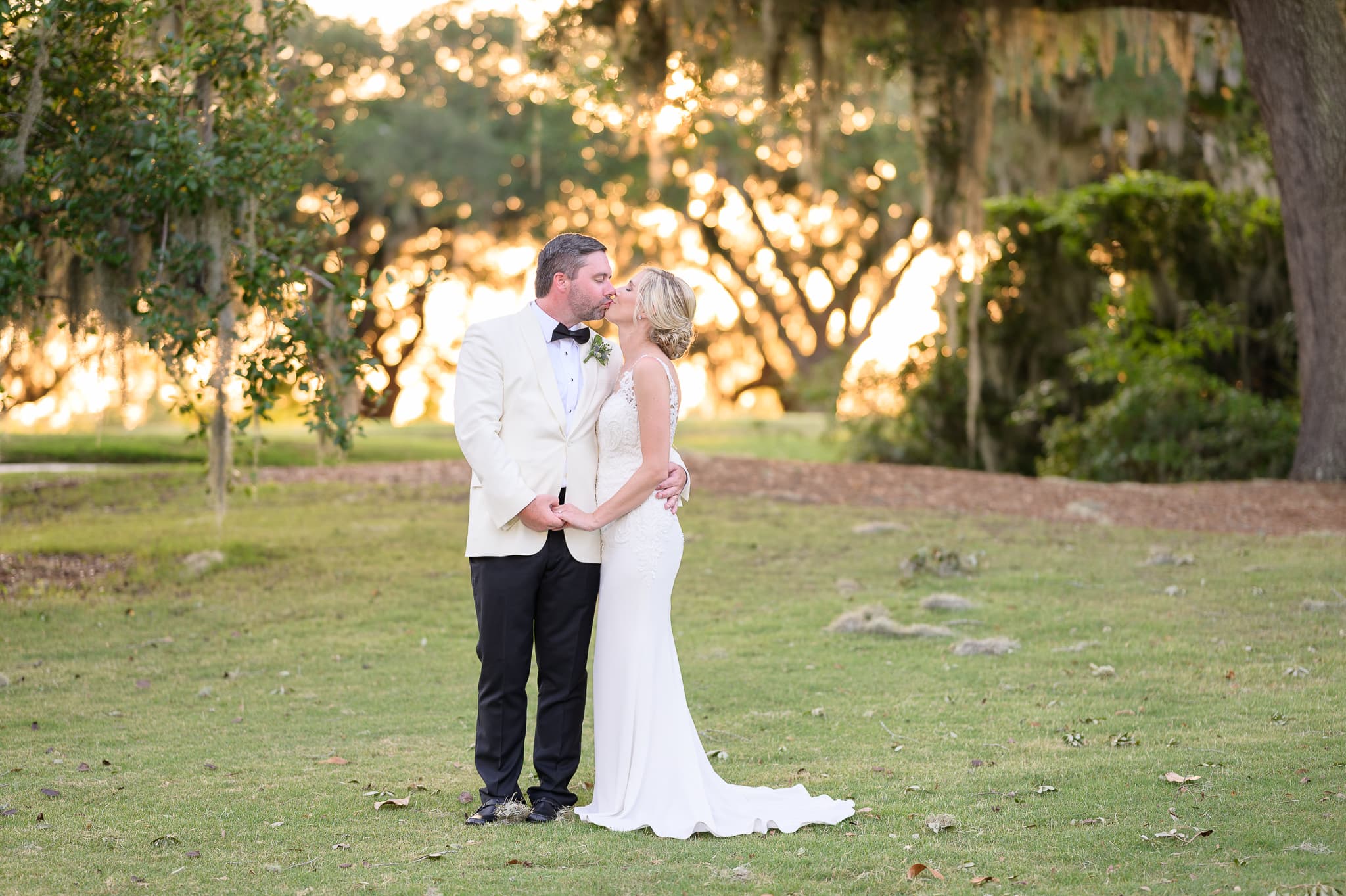 Kiss in front of the bokeh from the sunset - Caledonia Golf & Fish Club