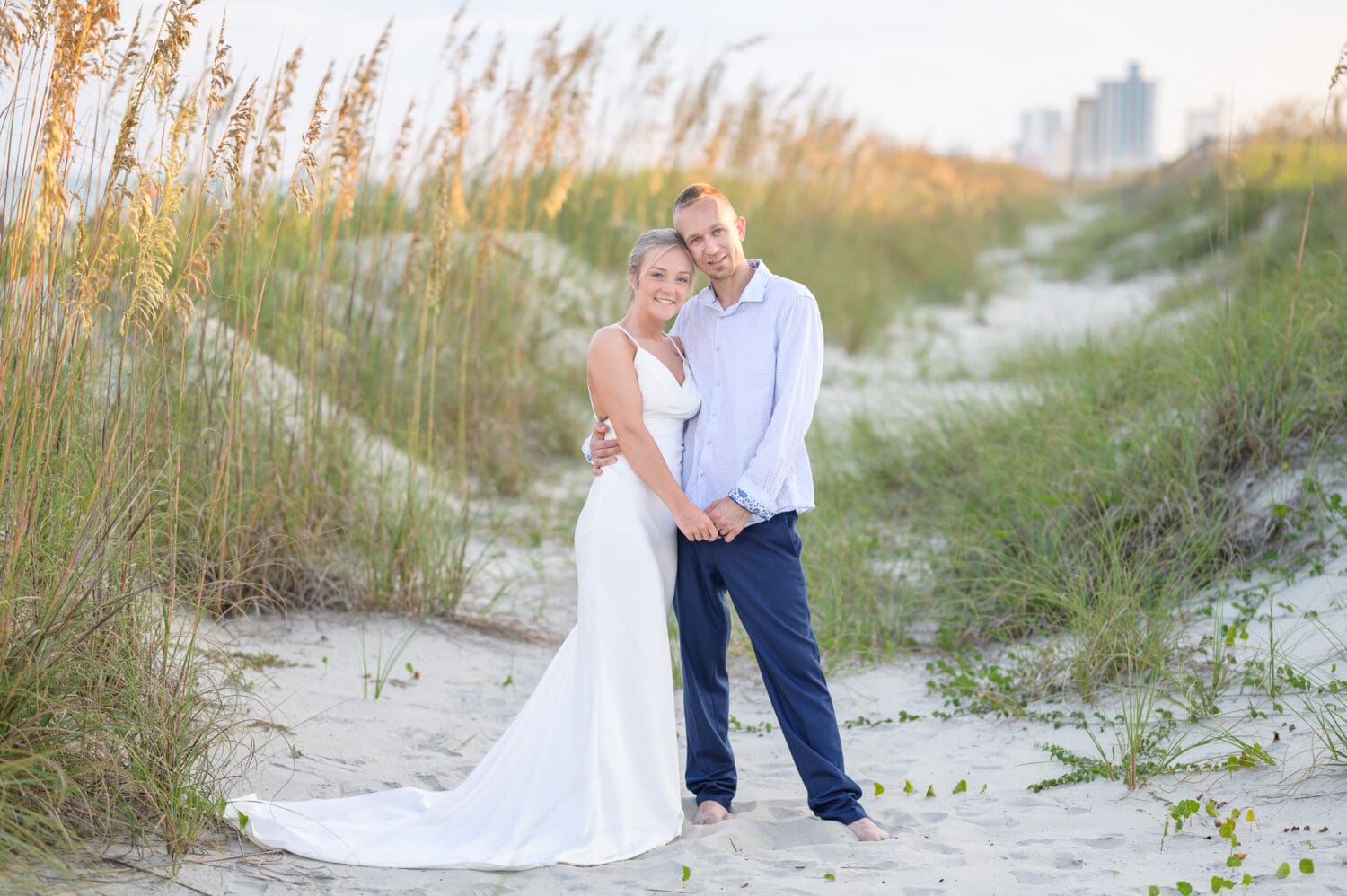 Bride and groom after an intimate wedding by the dunes - Myrtle Beach State Park
