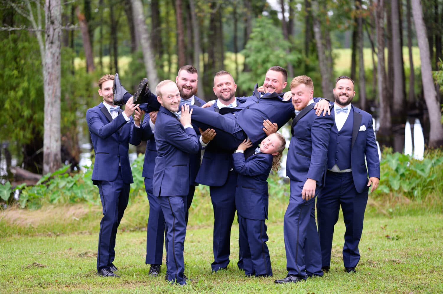 Guys lifting up the groom - Wildhorse at Parker Farms