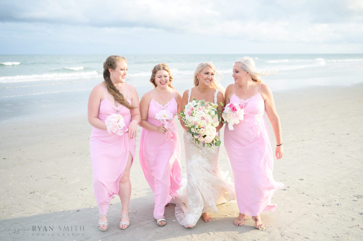 Bridal party walking on the beach - 21 Main Events at North Beach