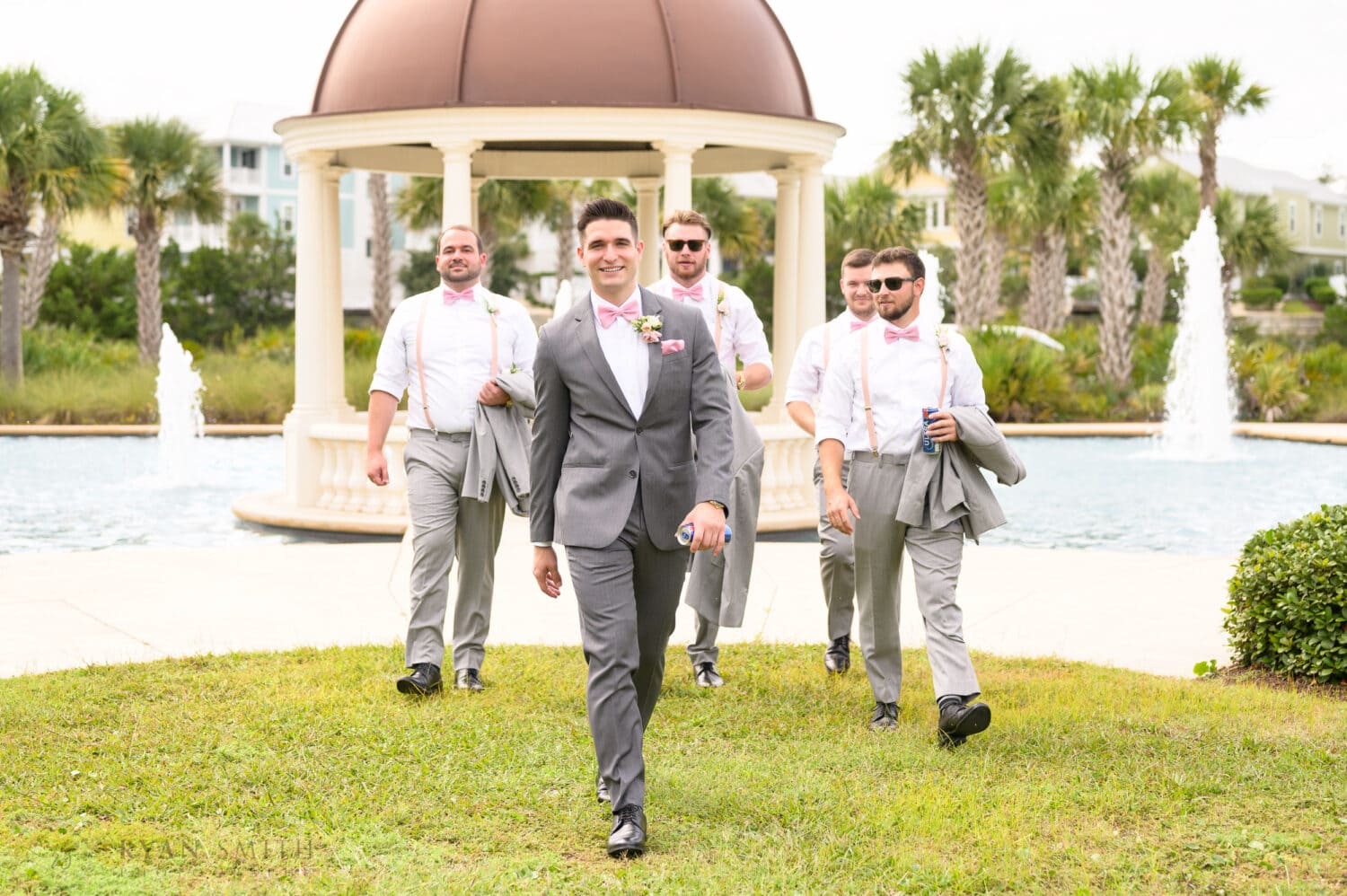 Groomsmen looking cool walking from the gazebo - 21 Main Events at North Beach