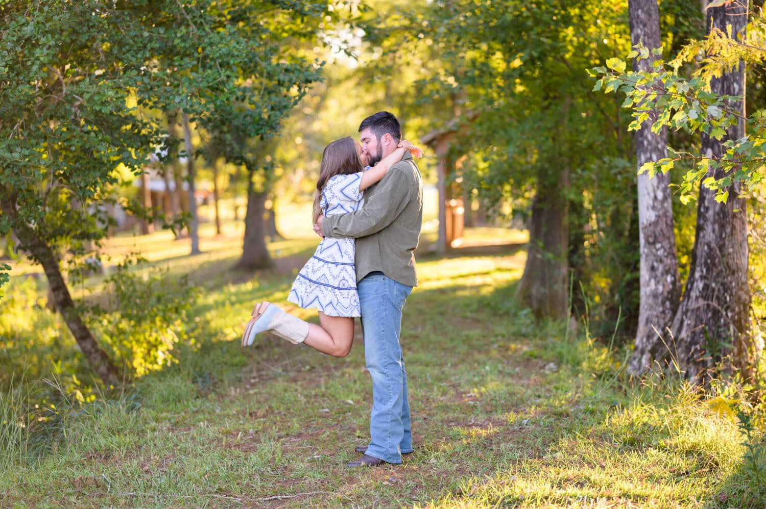 Lift into the air for a kiss with cowboy boots - Pine Log Plantation