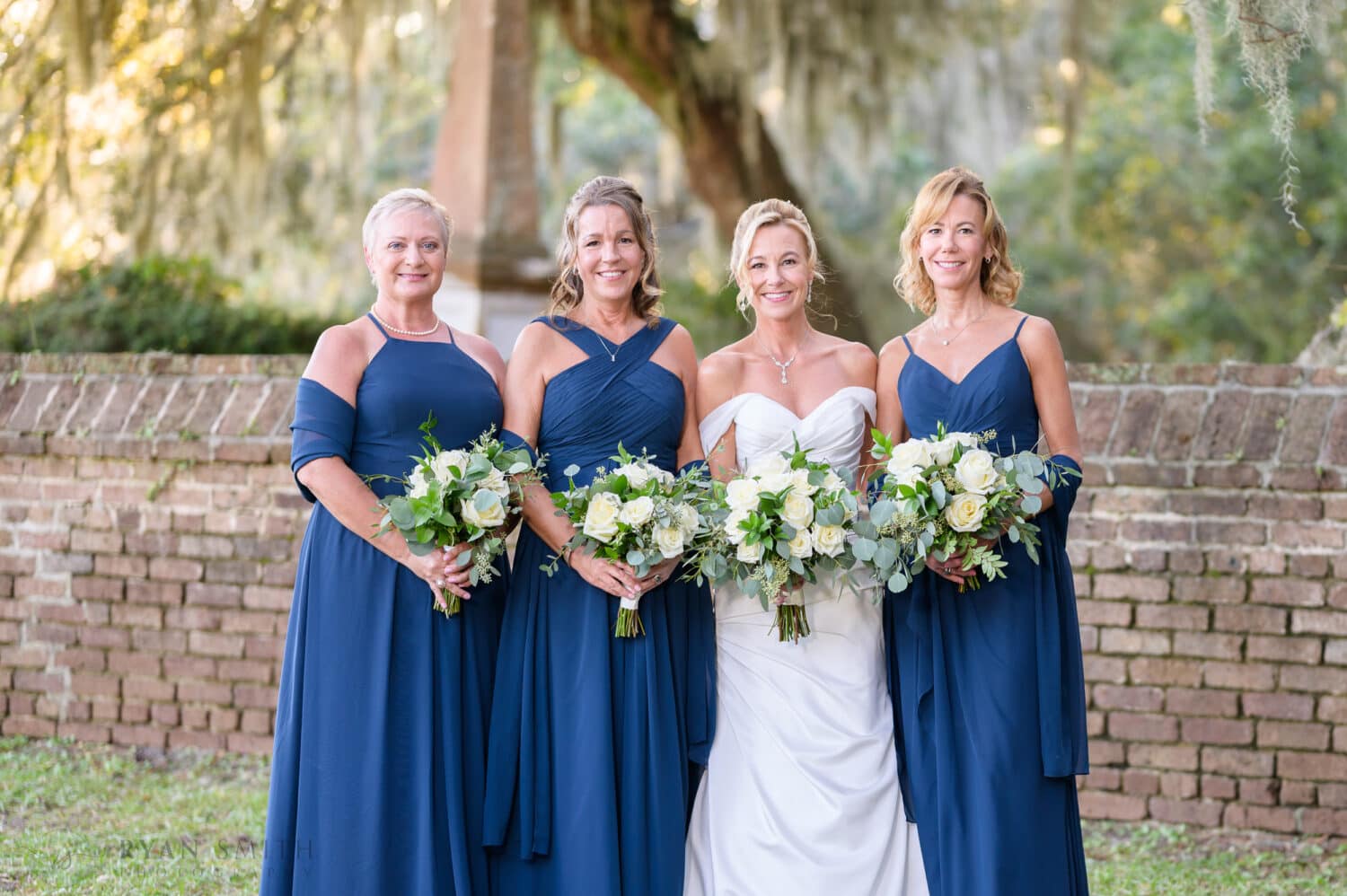 Bridesmaids holding the bouquets  - Safe Harbor Reserve Harbor Yacht Club