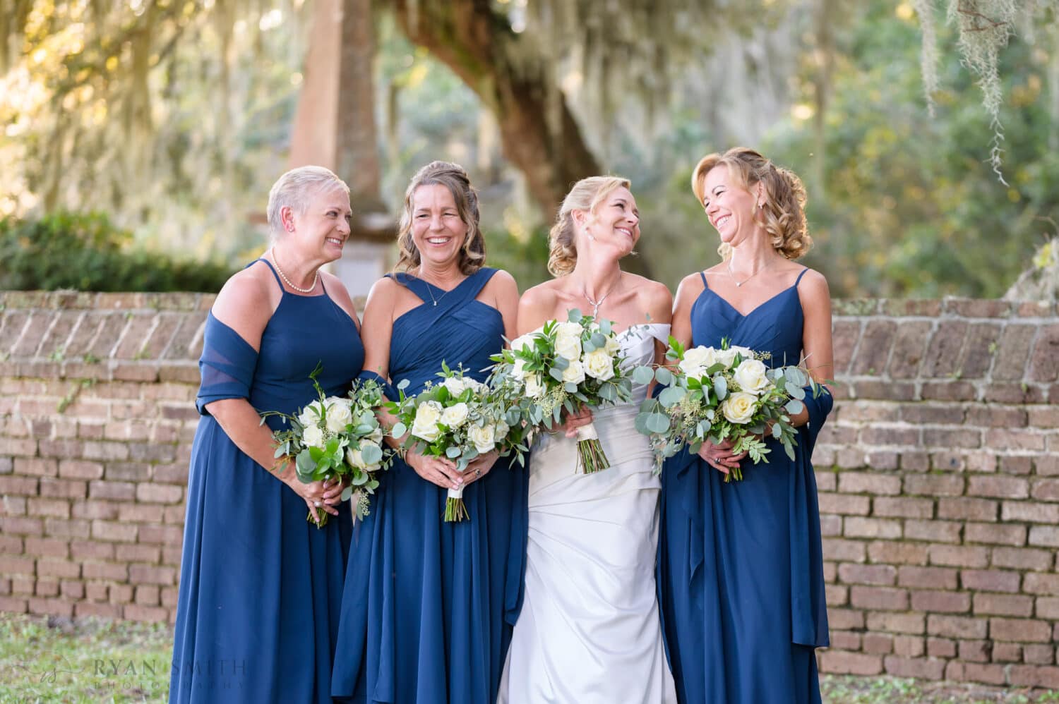 Bridesmaids laughing with each other - Safe Harbor Reserve Harbor Yacht Club