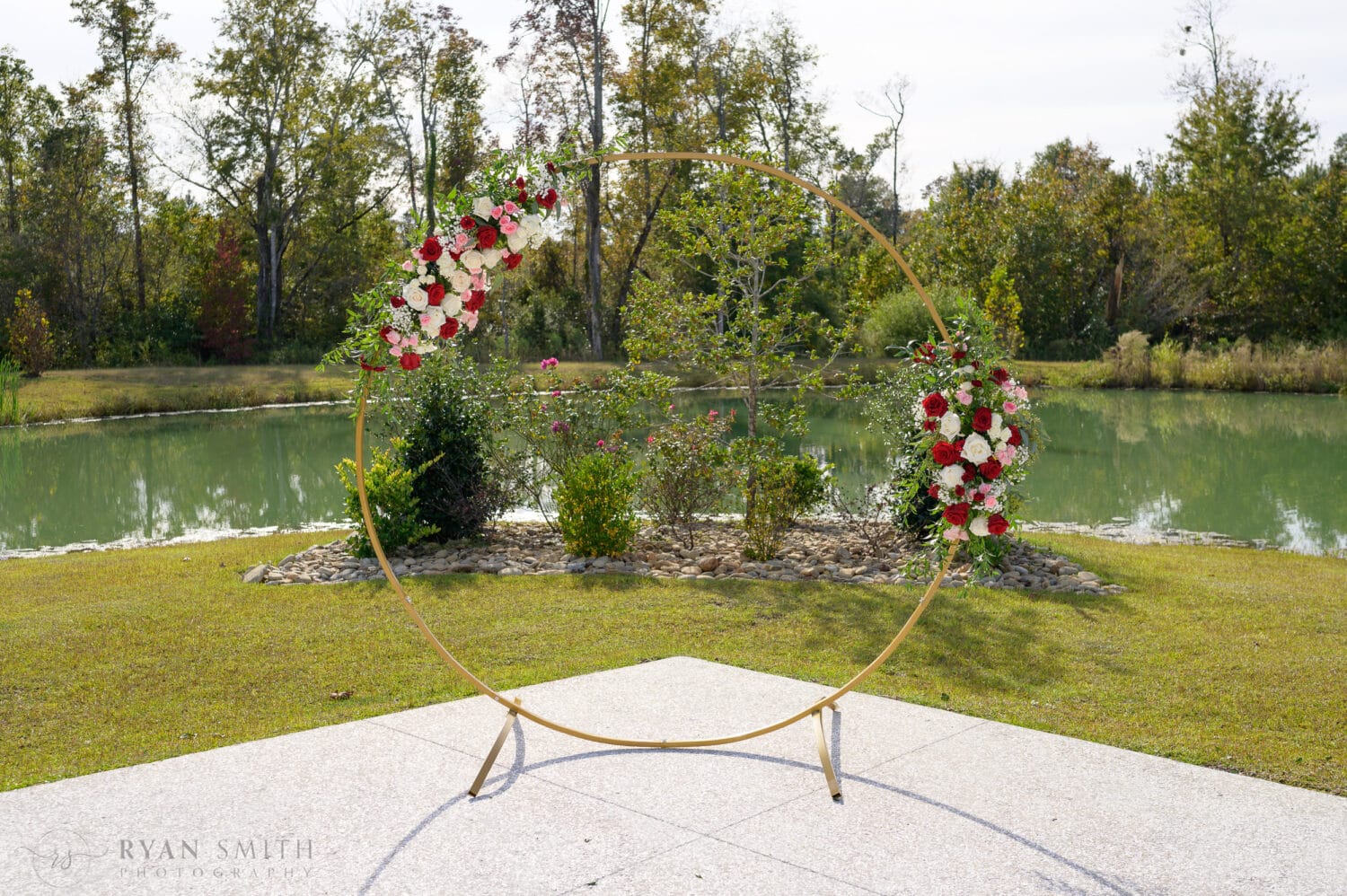 Ceremony arch with flowers - The Venue at White Oaks Farm