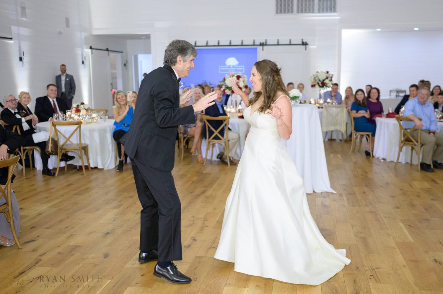 Dad and daughter having fun first dance - The Venue at White Oaks Farm