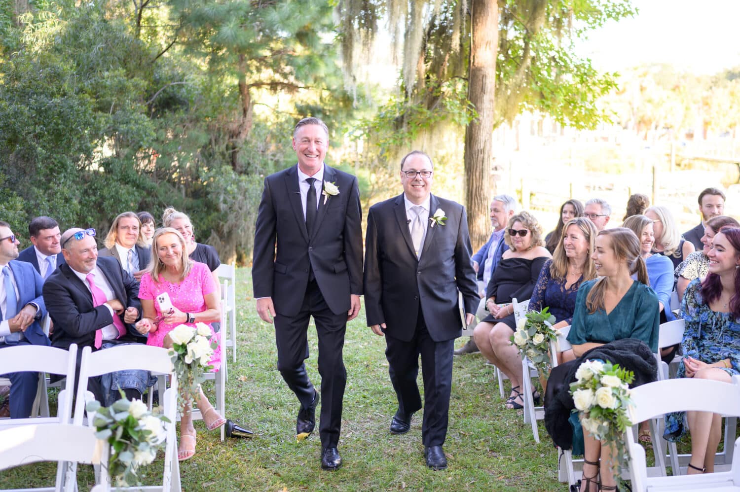 Groom walking to the ceremony - Safe Harbor Reserve Harbor Yacht Club