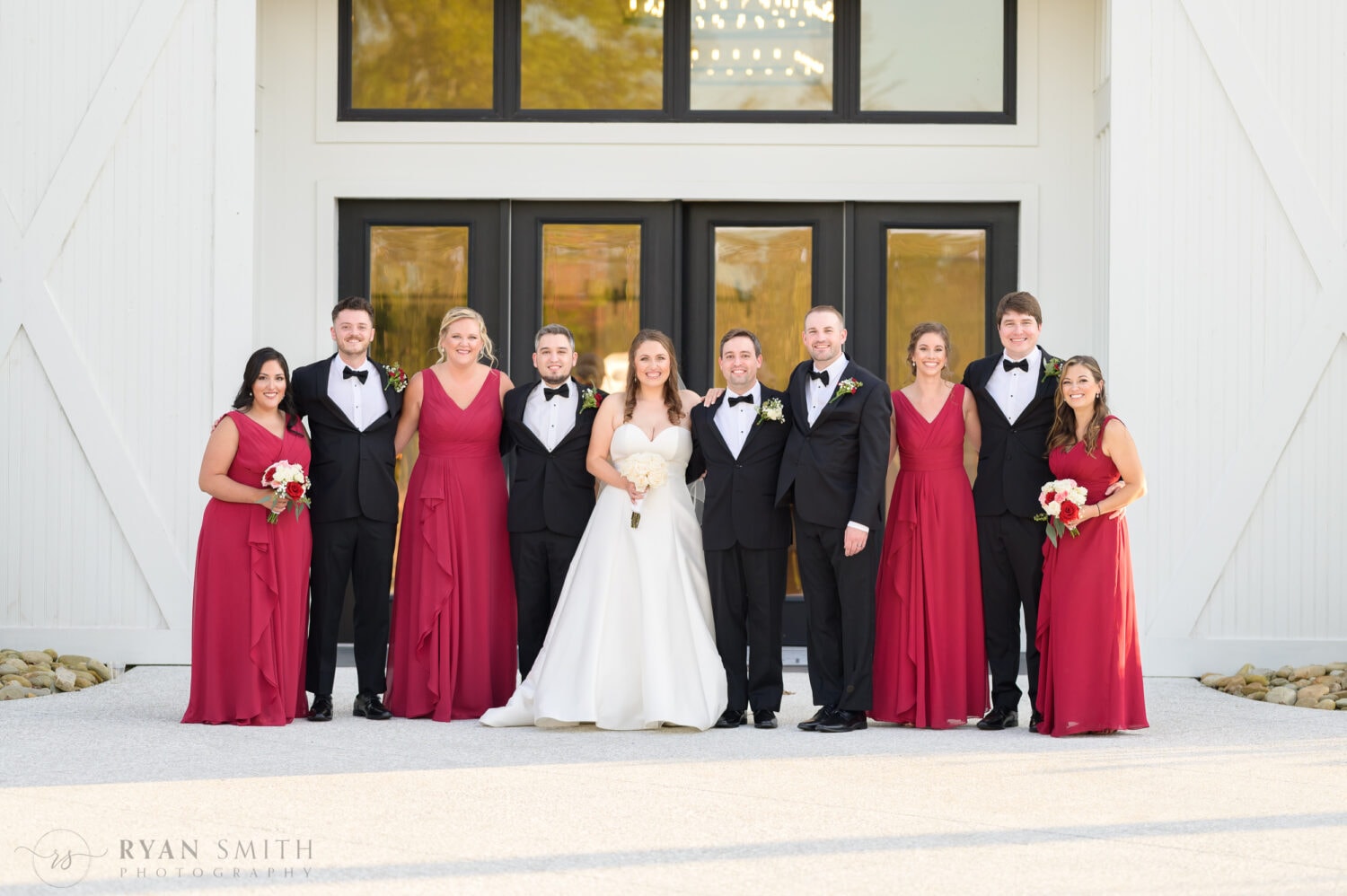 Hugs with the bridal party - The Venue at White Oaks Farm