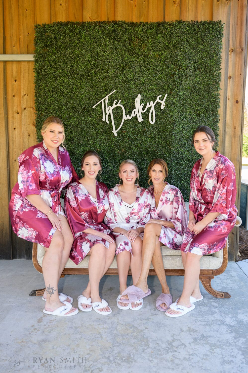 Bridesmaids sitting by the barn - The Blessed Barn