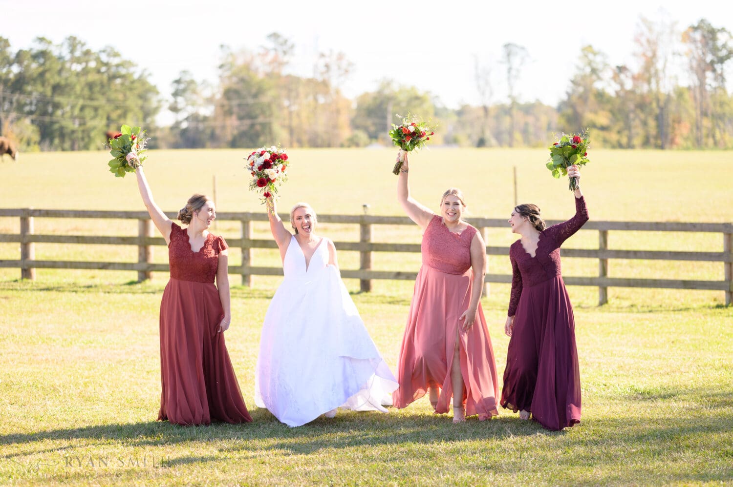 Bridesmaids walking together - The Blessed Barn