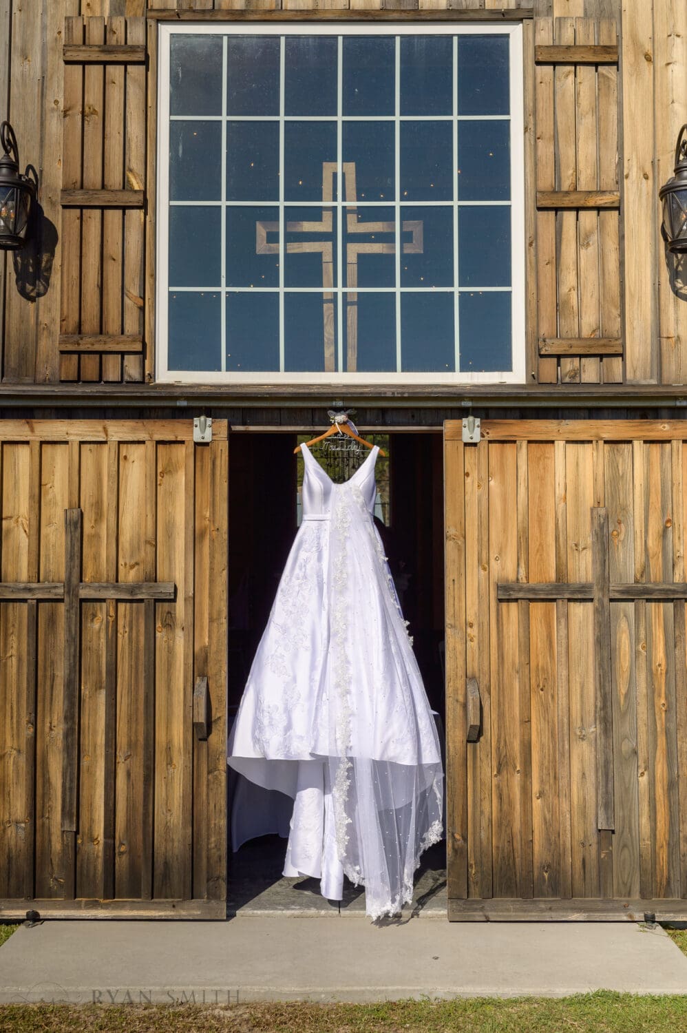 Dress hanging in front of the barn - The Blessed Barn