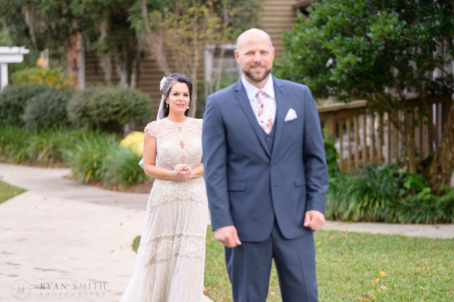 First look with bride and groom behind the house - The Cooper House