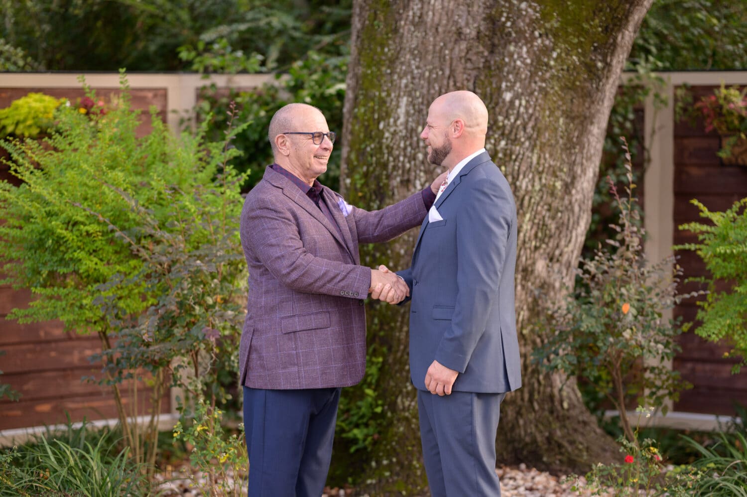 Groom shaking hands with his father - The Cooper House