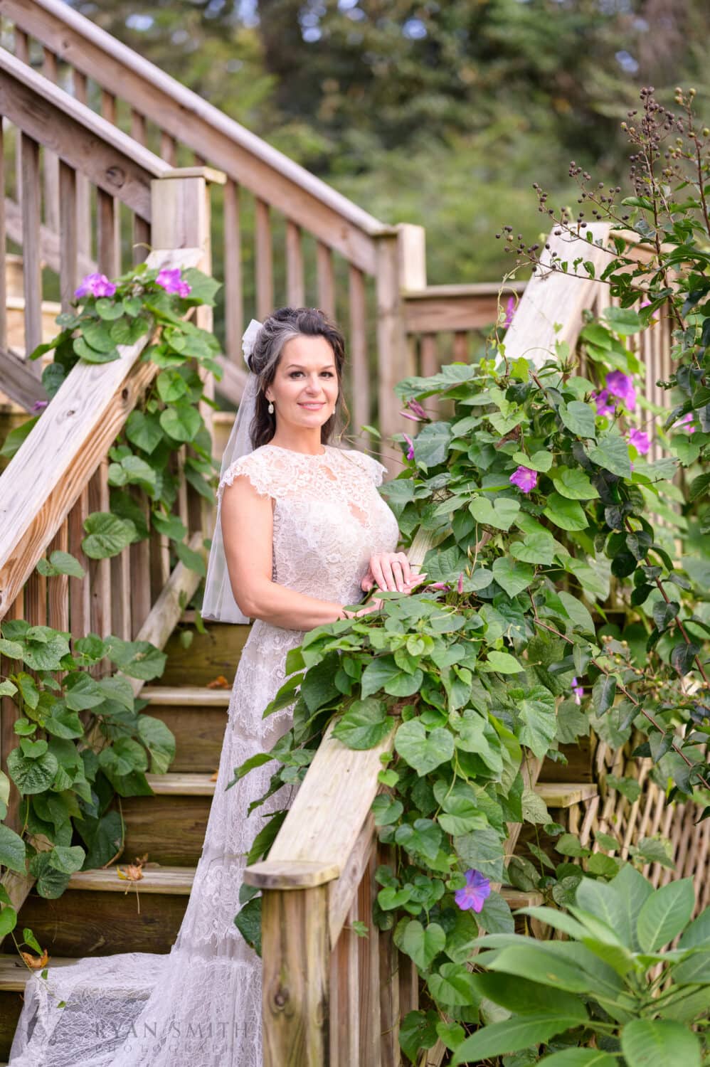 Portraits of bride on the ivy covered steps - The Cooper House