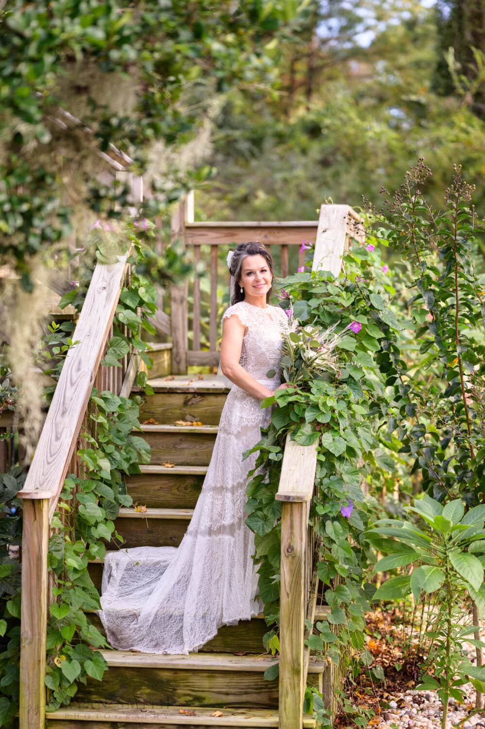 Portraits of bride on the ivy covered steps - The Cooper House