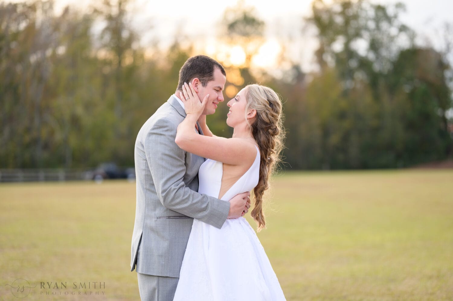 Sunset pictures with the bride and groom - The Blessed Barn