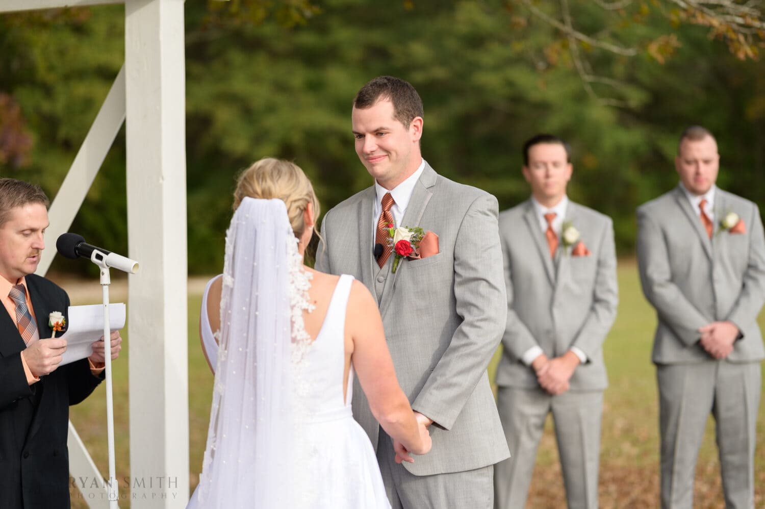 Vows with the bride and groom - The Blessed Barn
