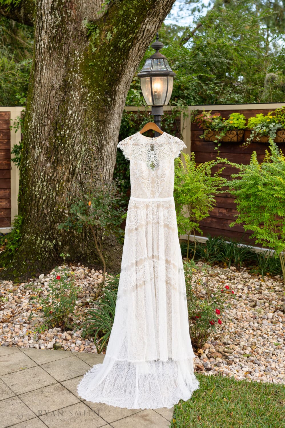Wedding dress hanging on the lamp post - The Cooper House