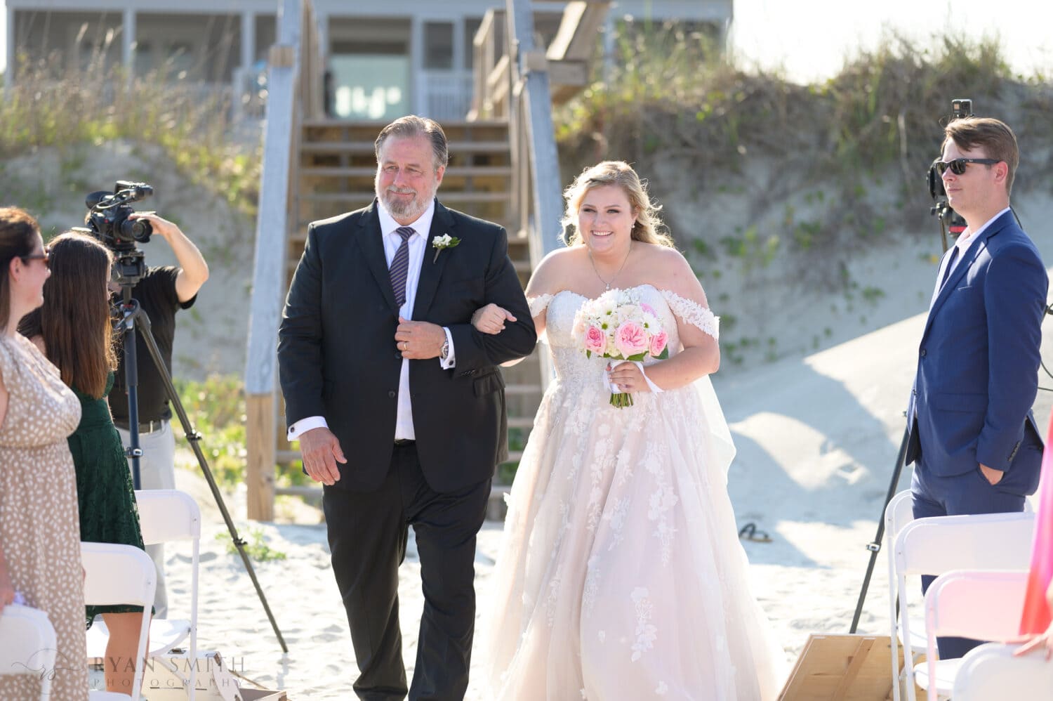Bride and father walking to the ceremony - Pawleys Island Beach House