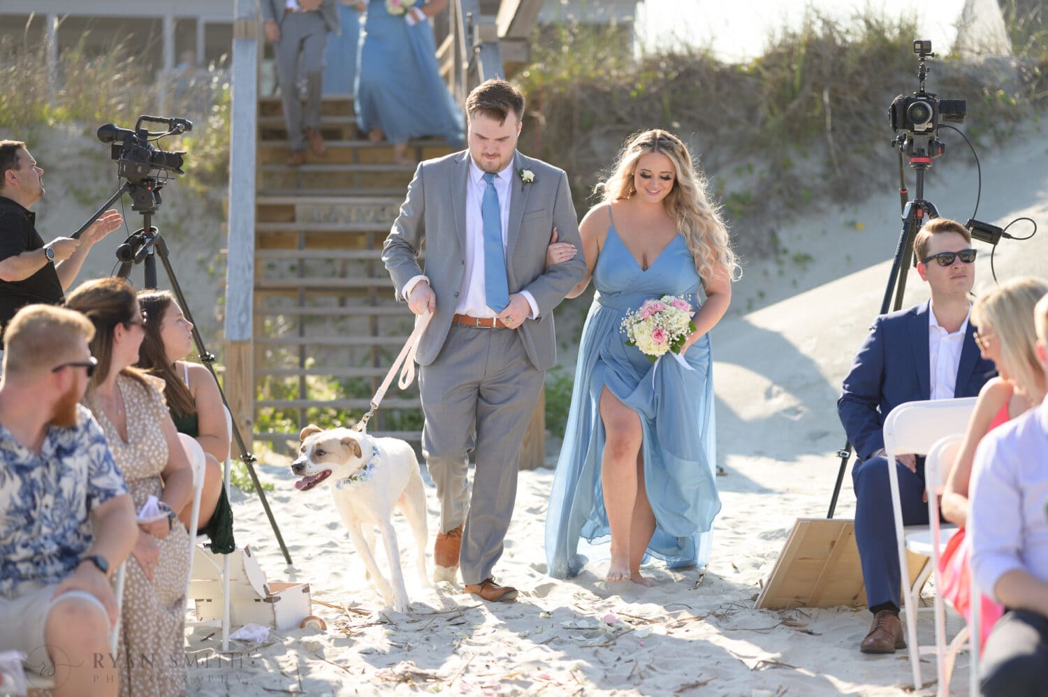 Bride and groom's dog walking to the ceremony - Pawleys Island Beach House