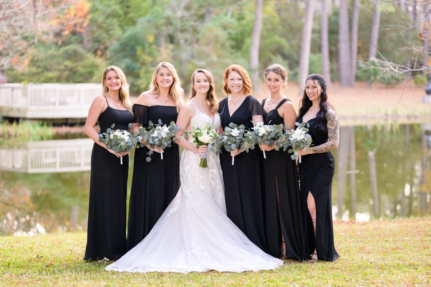Bride with bridesmaids by the pond - Brookgreen Gardens