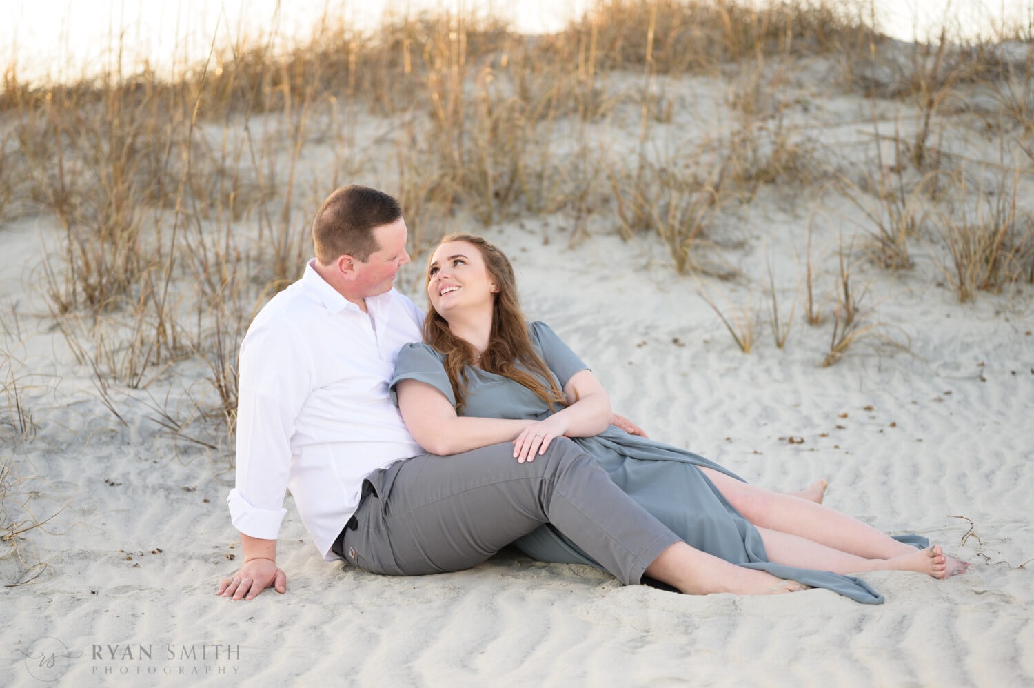Couple laying together in the sand - Huntington Beach State Park - Myrtle Beach