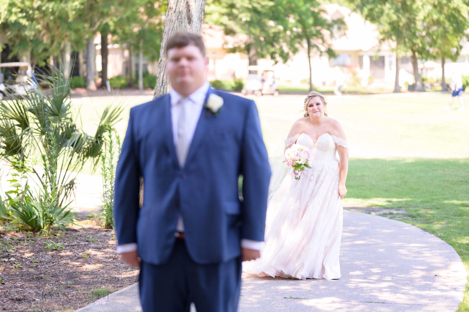 First look with the bride and groom on the golfcourse - Pawleys Plantation