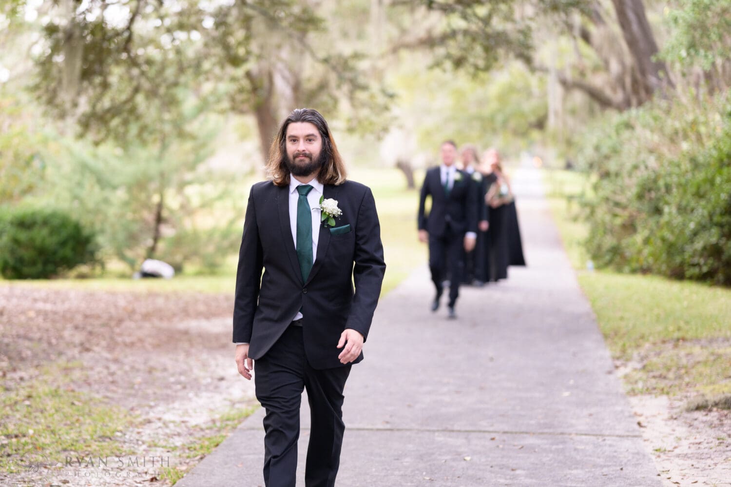 Grooms brothers walking to the ceremony - Brookgreen Gardens