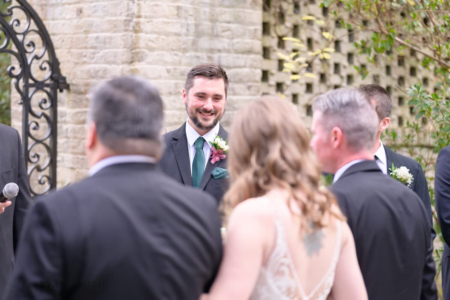 Happy groom looking at the bride - Brookgreen Gardens