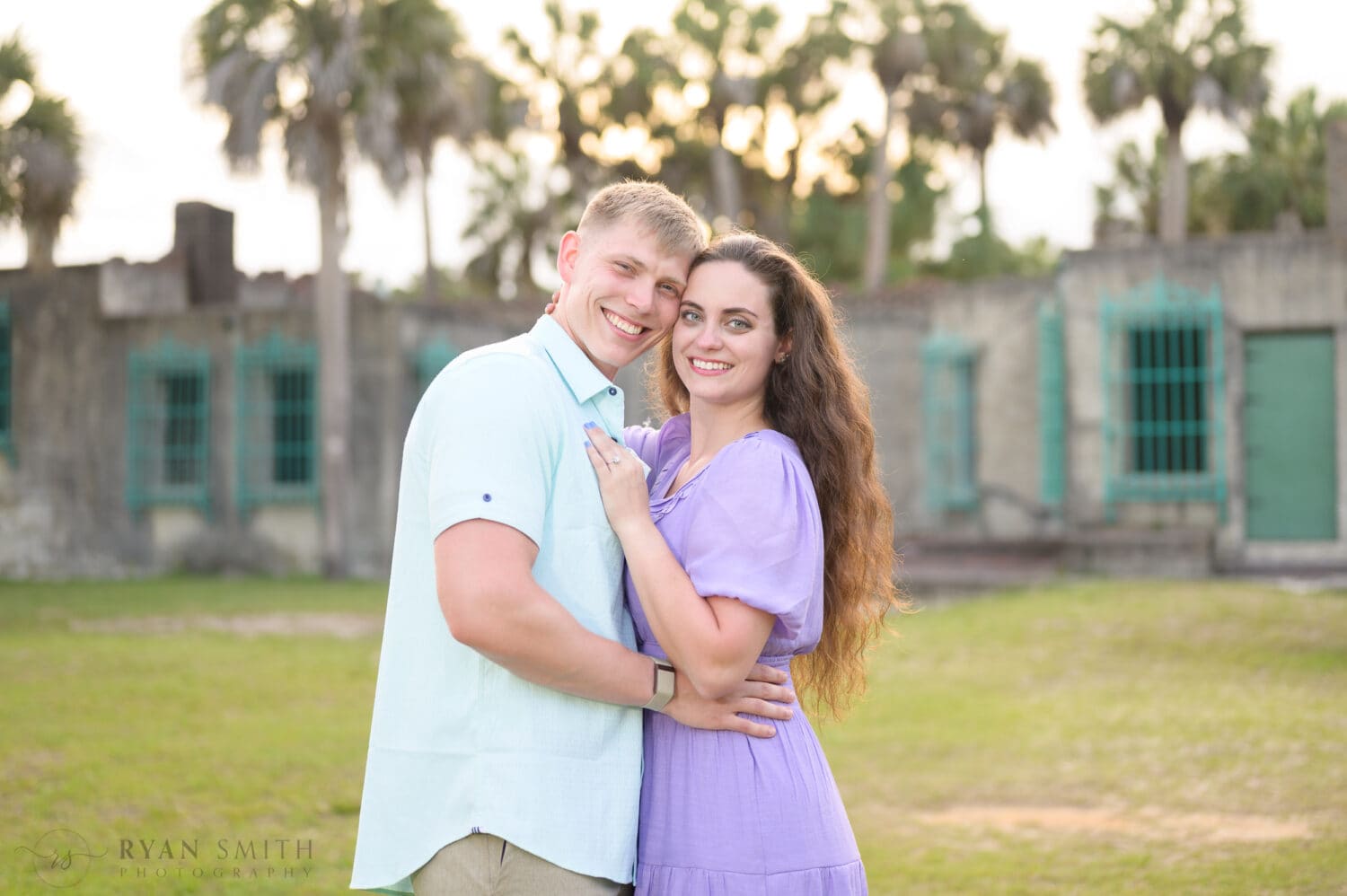 Just engaged couple in front of the palms a the castle - Huntington Beach State Park - Myrtle Beach