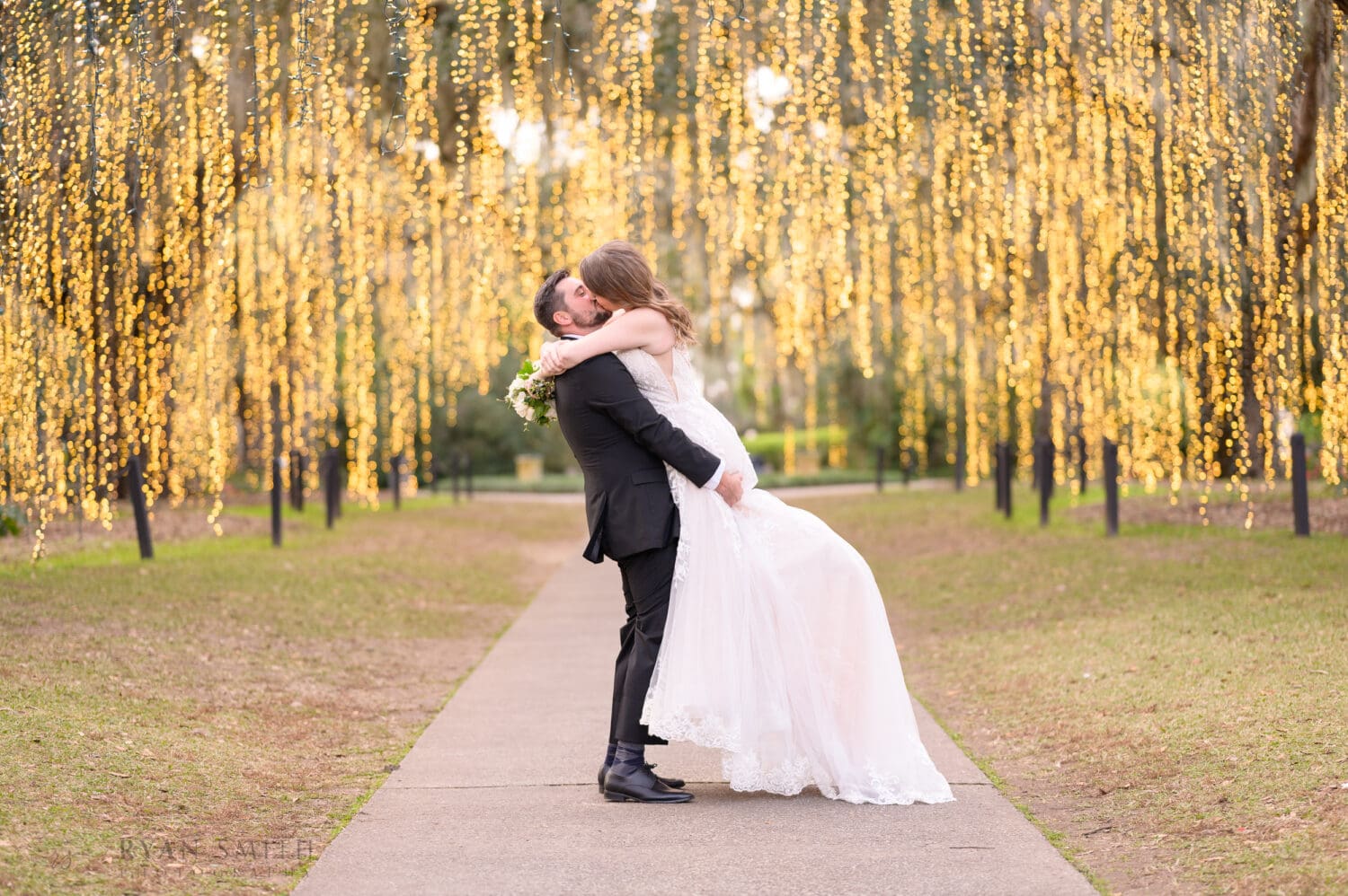 Lifting bride into the air - Oak Allee - Night of a Thousand Candles - Brookgreen Gardens