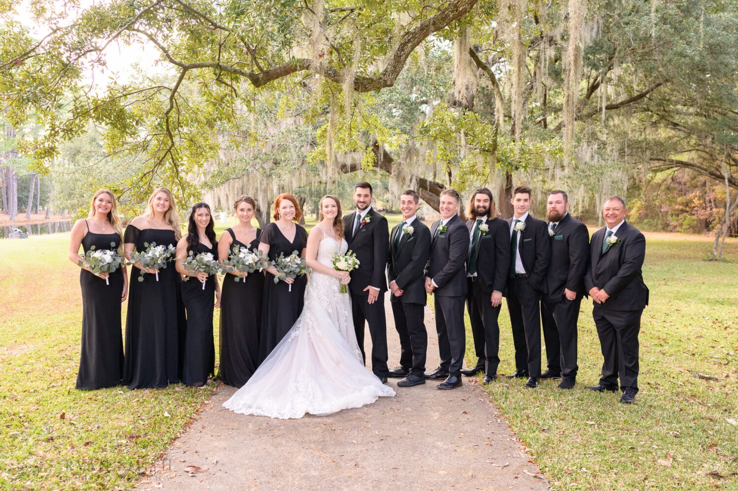 Wedding party on the walkway to the gardens - Brookgreen Gardens