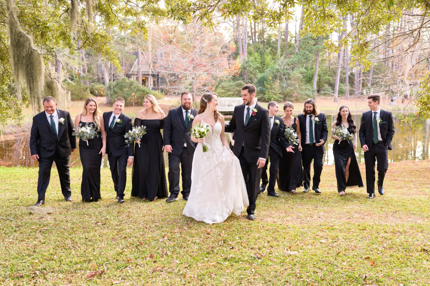 Wedding party walking together having a great time - Brookgreen Gardens