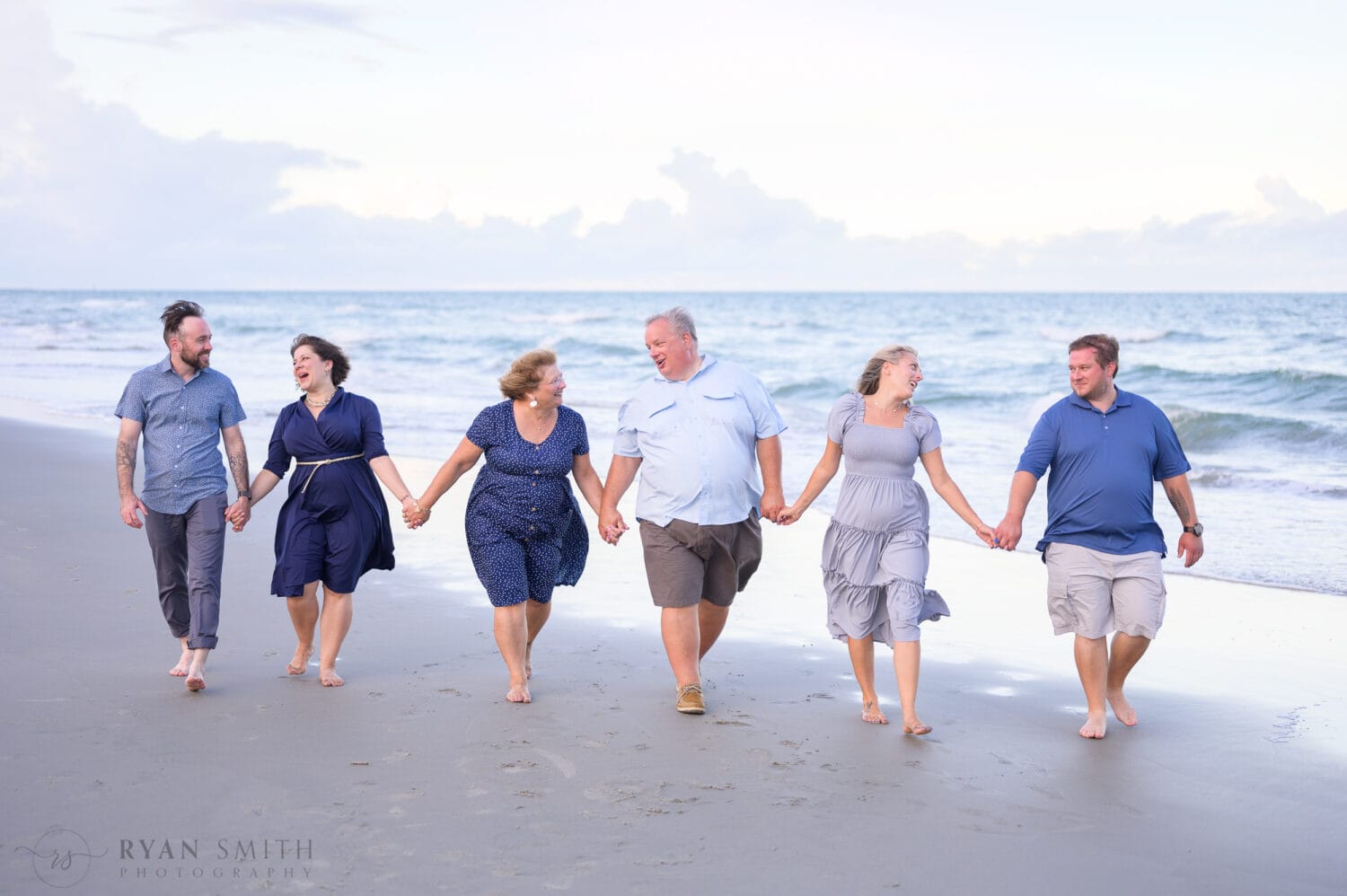 Adult family members coming together for a beach session - Pawleys Island