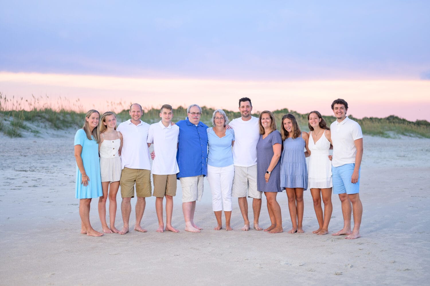 Big family by the dunes with a pretty sunset - Huntington Beach State Park