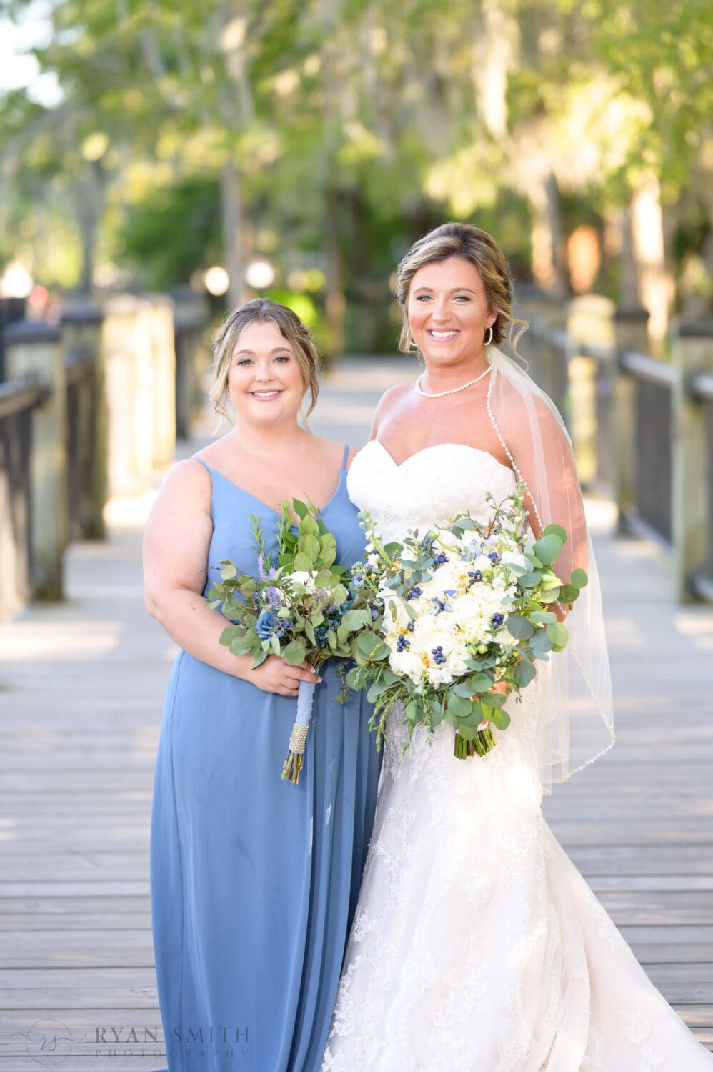 Fun pictures with each bridesmaid - The Conway Riverwalk