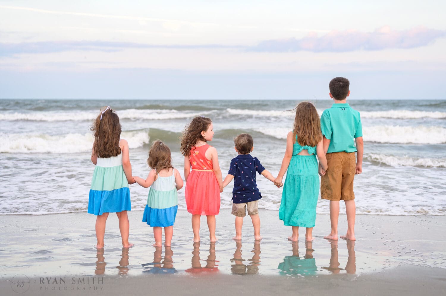 Lots of little ones taking pictures on the beach - Pawleys Island